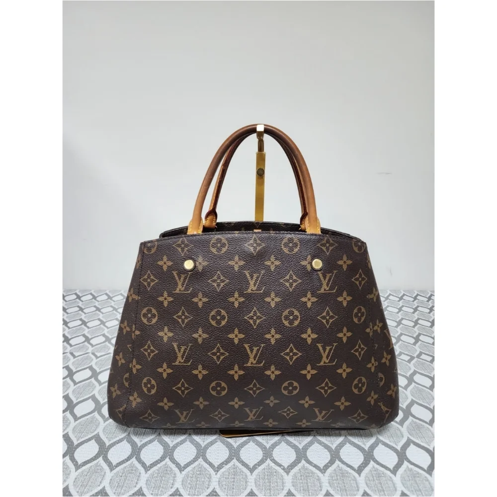 LOUIS VUITTON Monogram Canvas Montaigne MM Bag Brown